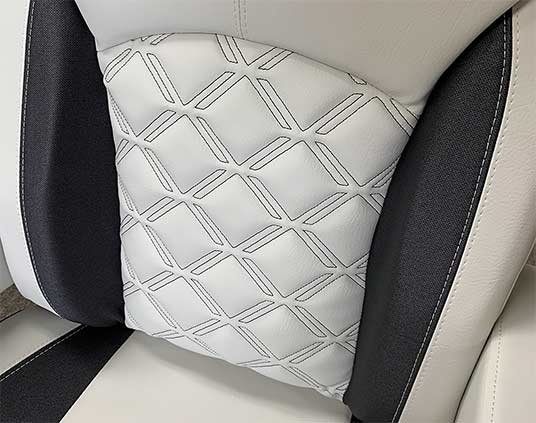 Marine chair featuring a custom Diamond-X stitch pattern upholstery panel.