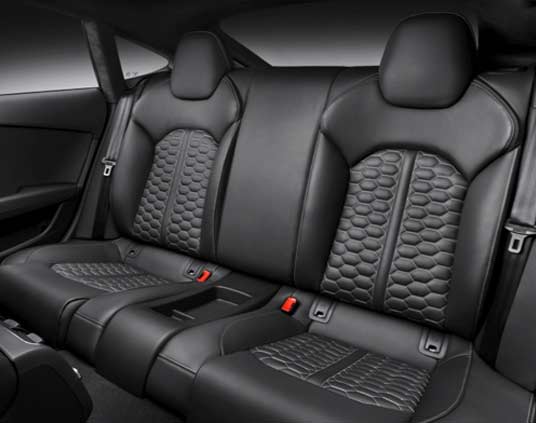 Black leather auto interior with stitched pattern inlays.
