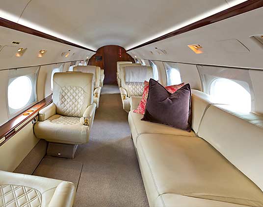 Private aircraft interior with patterned stitch inlays.